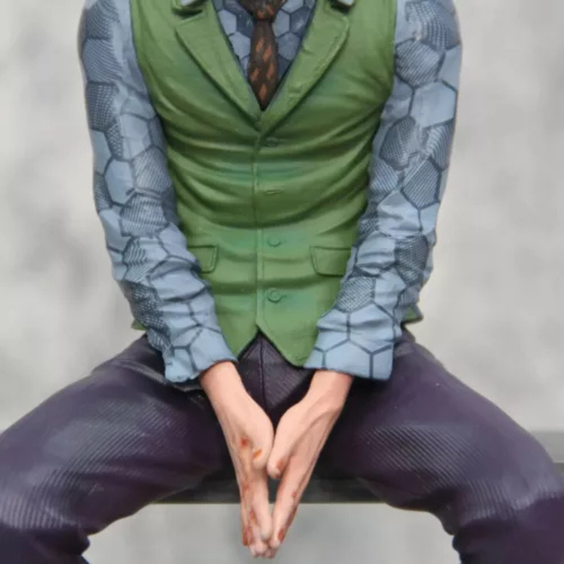DC Joker Seated Collector Figure with Mask | Trade Supply
